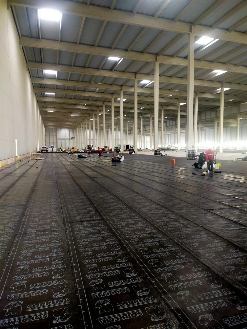 Radon barrier installation in an industrial building in Martorell